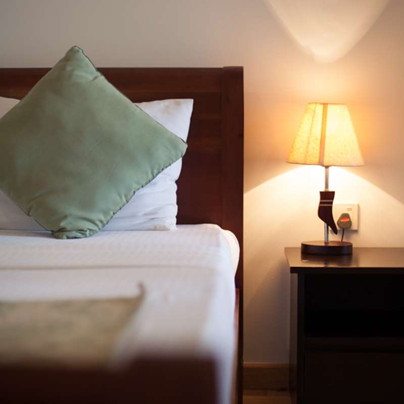 Standard Room Bedding in Oak Ray Lake Resort Tissamaharama