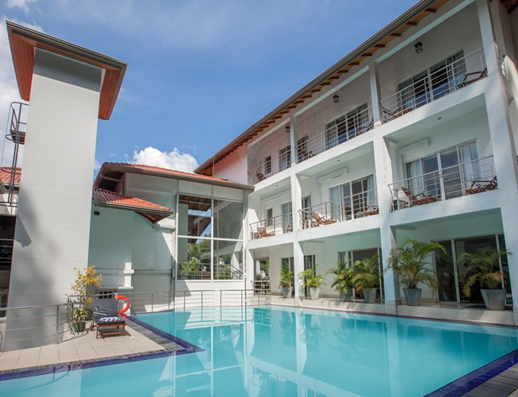 View of the Hotel from the Pool at Senani Hotel